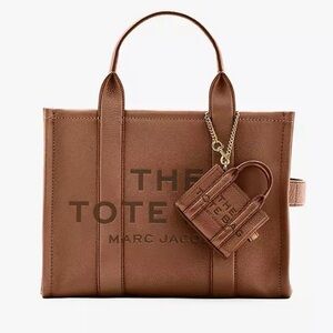 NWT! Authentic Marc Jacobs bag charm/earbuds case/coin bag + MJ Dust bag!